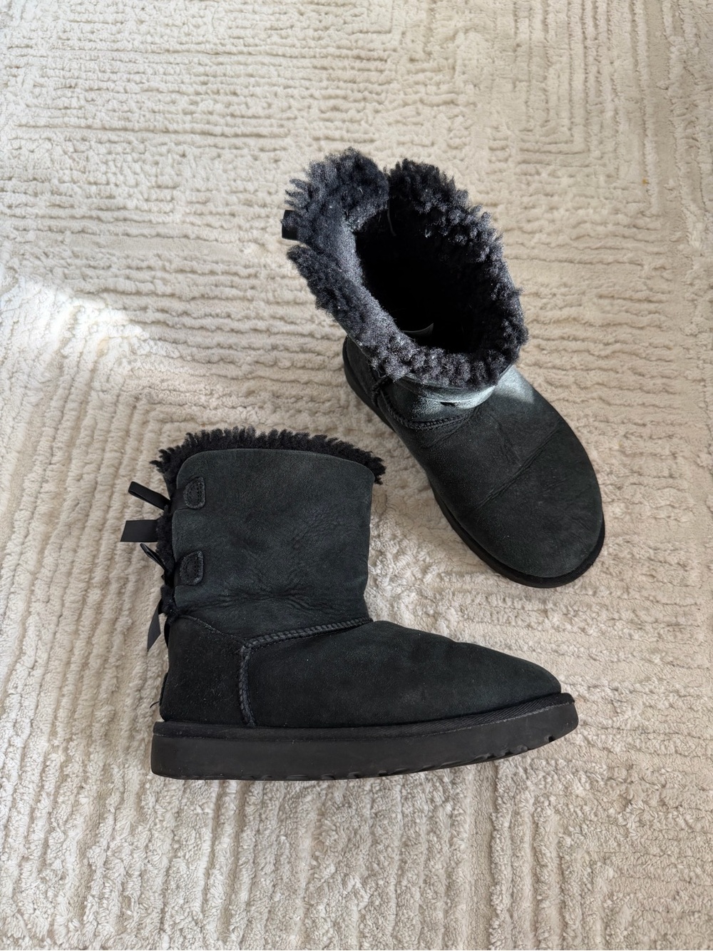 Ugg black boots with bows